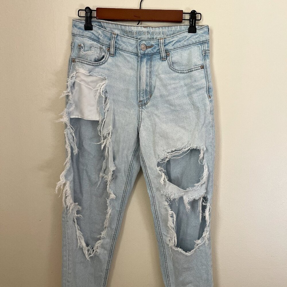 AEO Distressed Low Rise Light Washed Denim Jeans